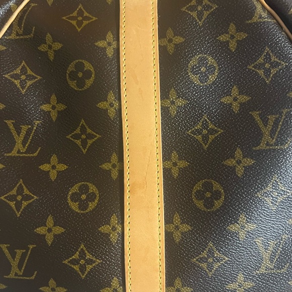 KEEPALL 45 LOUIS VUITTON
DUFFLE TRAVEL WEEKENDER BAG
CROSSBODY DUFFLE BAG/BOX - Picture 14 of 16